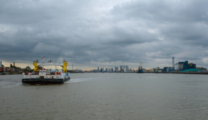 Woolwich ferry arriving on the North side of the River Thames