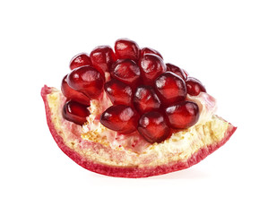 Ripe pomegranate fruit segment isolated on white background