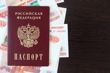 Russian passport and currency business and travel concept