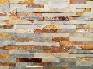 Wall of natural stones, wall texture background