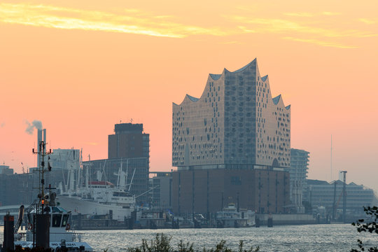 Elbe Philharmonic Hall (Elbphilharmonie) and River Elbe panorama in autumn at morning with sunrise in Hamburg, Germany