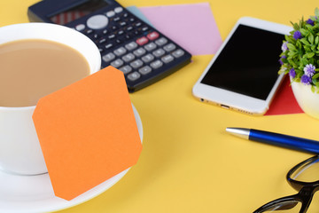 Empty card with coffee and phone