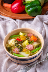 delicious autumnal vegetable soup with sausage and bacon