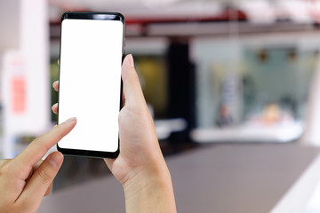 Hand using smartphone with empty screen display for present app.