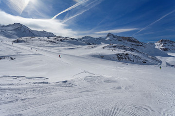 Fototapeta na wymiar Cervinia, Valle d'Aosta, Italy - Mountain skiing and snowboarding