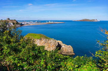 Fototapeta premium Landscape with harbor of Howth near Dublin, in the background the island Irelands Eye, Ireland
