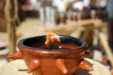 Oil lamps are lighting fixtures that are fueled with oils
