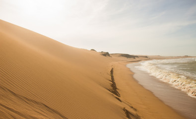 Sand dunes and the ocean in northeastern part of Colombia, cabo de la vela, la guajira, punta gallinas
