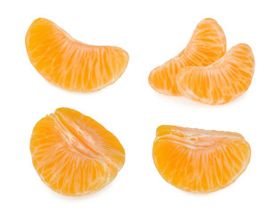Tangerine slices isolated on white background © azure