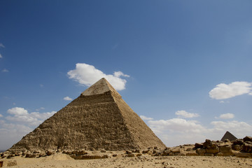 Fototapeta na wymiar Pyramid of Chephren or Khafre, Great Pyramids of Giza, Cairo, Egypt, set against a bright blue sky