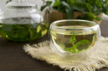 Vegetable organic mint tea in a glass bowl.