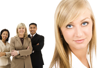 businesswoman with her colleagues in background