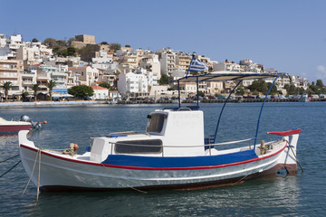 Fototapeta na wymiar Fishing boats in greek Sitia harbor