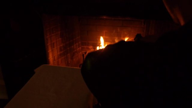 Pistol loaded and aimed at a fireplace - two-shot sequence 4K