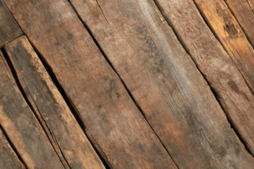 Abstract wooden texture. Old brown wooden planks. Rough rustic wooden boards.