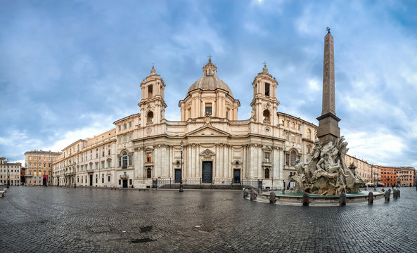 Panorama of Piazza Navona square with Fontana dei Fiumi fountain and Sant'Agnese in Agone church, Rome, Italy