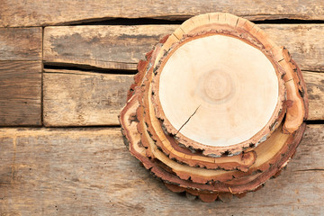 Natural wooden discs, top view. Round wooden discs for decor. Rustic wedding centerpiece.