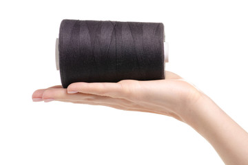 thread black sewing in hand isolated on white background