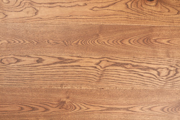 Horizontal seamless wooden background. Light brown smooth laminate texture. Wooden patterned background for banner.