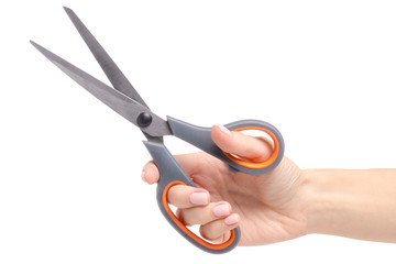 Scissors in hand on white background. Isolation.