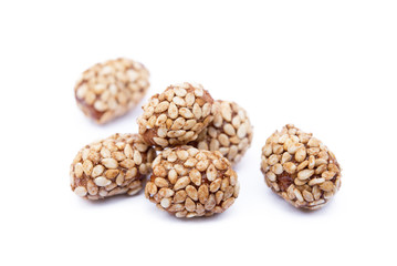 Coated peanuts with sesame isolated on white background