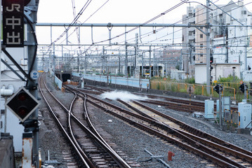 Fototapeta na wymiar レールミスト 中野駅メトロ東西線