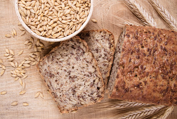 Multi-grain bread on a wooden background. Healthy food concept.