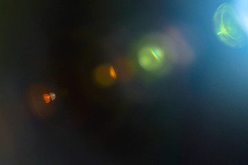 Lights blurred and distorted, lens reflexes. 