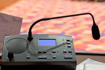 Translator room . translators cubicle . interpreting - Microphone and switchboard in an...