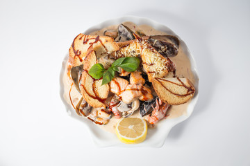 Seafood Chateau with crayfishes, mussels, salmon, crackers, cheese and lemon