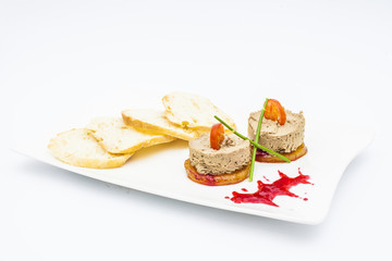 Liver paste with tomatoes, green, crackers and sauce
