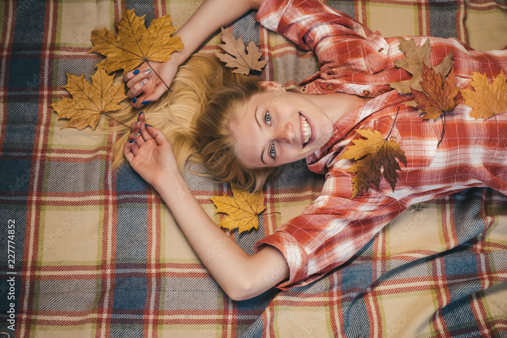 Wall mural sensual woman wearing pullover and looking at camera. girl wearing in autumn clothes on autumn sunny