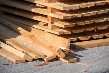 Clean planed boards in a pile
