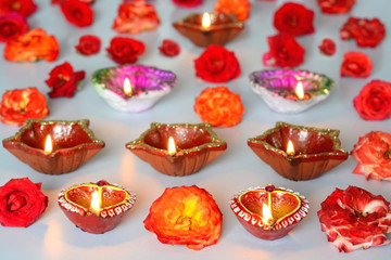 Diwali decoration with colorful lamps and flowers