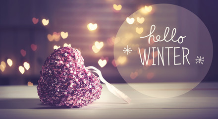 Hello Winter message with a pink heart with heart shaped lights