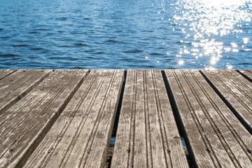 Empty  wooden platform with sea background