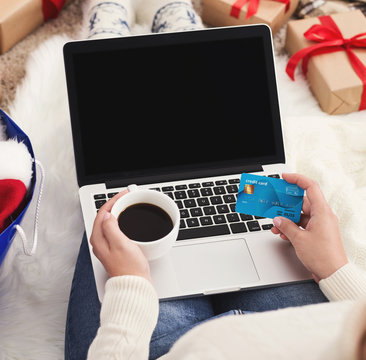 Ordering presents. Woman buying gifts in internet