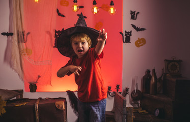 Halloween dresses and witch costumes and witch hats. Halloween background. Horror faces. Background...