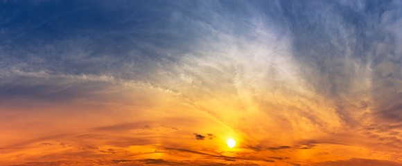 Panorama twilight sky with sun and clouds backgound