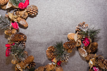 New Year's, Christmas decorations on a gray background (coniferous branches, cones)