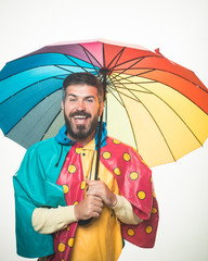 Autumn mood and the weather are warm and sunny and rain is possible. Brutal bearded man with...
