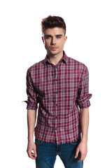 Fototapeta premium portrait of attractive young man wearing a plaid shirt