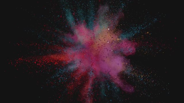 Ultra slowmotion shot of color powder explosion isolated on black background. Shot with high speed cinema camera at 1000fps