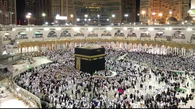 Time lapse of Muslim pilgrims circumambulate the Kaaba in Mecca, Saudi Arabia.