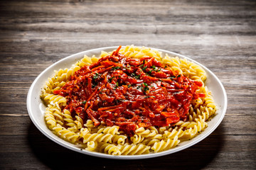 Fusilli with meat, tomato sauce and vegetables