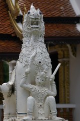 lion dog with buddha