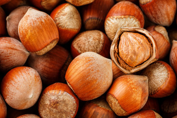 Hazelnuts. Stack of hazelnuts. Food background. Hazelnut background. Hazelnuts in shells background