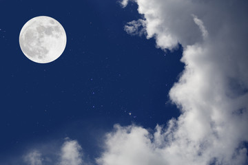 Fototapeta na wymiar Romantic night. Full moon over cloudscape background.