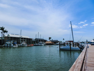 Fototapeta na wymiar The yachts at boat marina and waterfront in Naples, Florida at USA