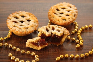 Christmas mince pies on a wooden background
